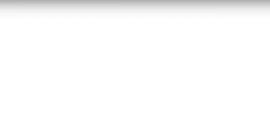 Nearly empty white wide image with a light grey gradient across the top