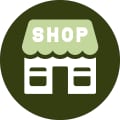 White shop storefront icon with the word SHOP in a dark green circle