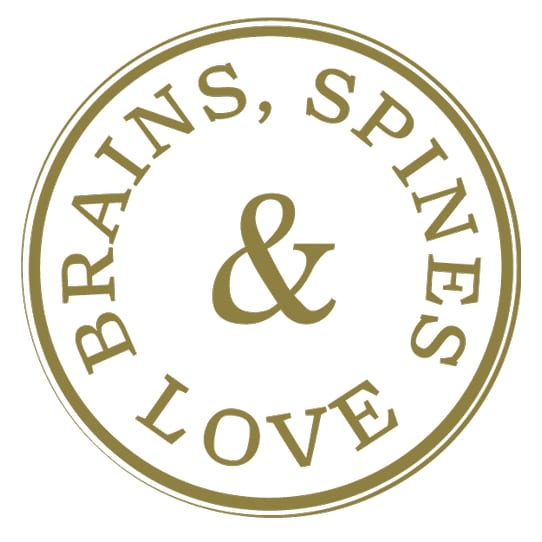 Gold circular stamp reading Brains, Spines & Love