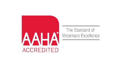 AAHA Accredited logo: red rounded square with white letters and the text The Standard of Veterinary Excellence