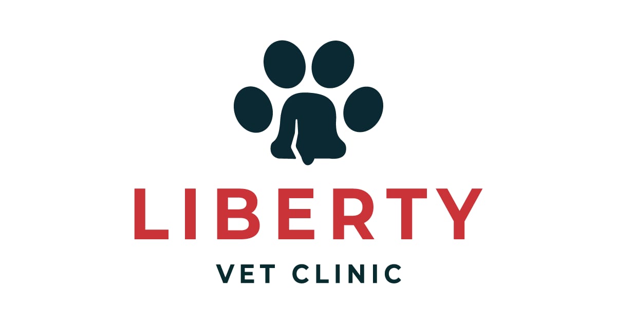 Liberty Vet Clinic logo with a dark paw print containing a bell shape above red lettering