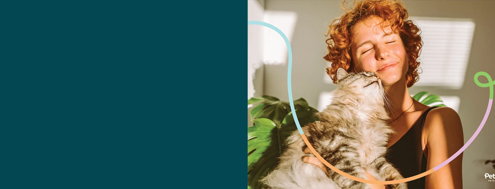Banner with a dark teal block and a woman with curly red hair kissing a fluffy cat