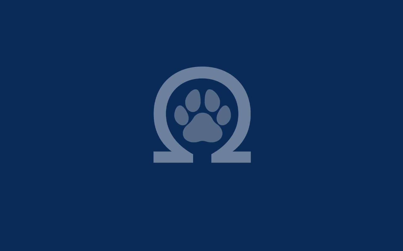 Pale blue omega symbol containing a paw print on a navy blue background
